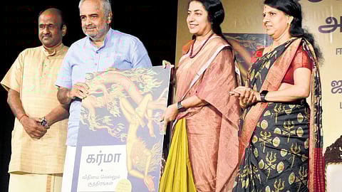 Murali M, the managing director of Sri Krishna Sweets, ‘Kalaimamani’ Marabin Maindan Muthiah, popular speaker Bharathi Bhaskar and actor and director Suhasini Maniratnam, presenting the book ' Karma-Vidhiyai Vellum Suthirangal'
