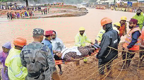 People stranded in Mundakkai area being rescued by the Army, NDRF and SOG personnel