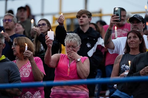Family, friends and community attend a candlelight vigil for Corey Comperatore, the former fire chief shot and killed at a weekend rally for former President Donald Trump.