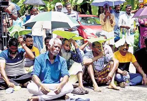 Chellanam residents protesting against the state government for the delay in finding a permanent solution to sea attack, by blocking Fort Kochi-Alappuzha coastal road at Kannamaly on Friday