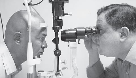(L-R) Chandan Sen as Manik Babu. Bratya Basu, actor and West Bengal Education Minister, plays a doctor