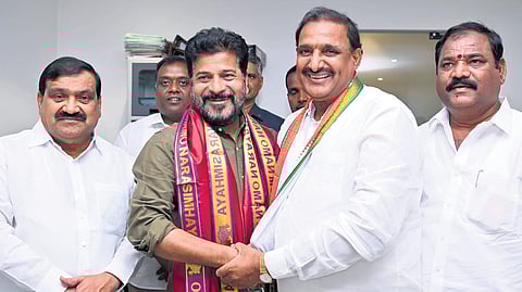Chief Minister and TPCC president A Revanth Reddy welcomes BRS Serilingampally MLA Arikepudi Gandhi into the Congress fold in Hyderabad on Saturday