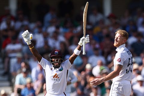West Indies Kavem Hodge (L) celebrates his century on the second day of the second Test cricket match between England and West Indies at Trent Bridge in Nottingham on July 19, 2024.