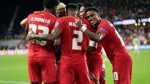 Panama's Jose Fajardo is congratulated after scoring his side's opening goal against Bolivia during a Copa America match in Orlando