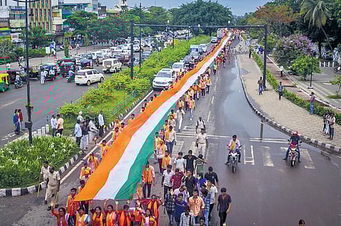 Members of Bharatiya Janata Yuva Morcha take out a Tricolour rally to commemorate Kargil
Vijay Diwas, in Bhubaneswar on Saturday