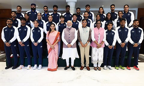 Prime Minister Narendra Modi and Indian Olympic Association (IAO) President P T Usha with Paris Olympic team 2024
