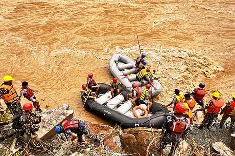 Rescue operation underway after two buses were swept away by a landslide and pushed into a swollen river at Simaltal area along the Narayanghat-Mugling road in Chitwan district, Nepal.