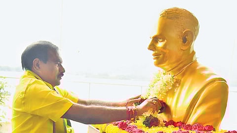 Water Resources Development Minister Nimmala Ramanaidu pays floral tributes to the statue of irrigation expert KL Rao in Vijayawada on
Monday