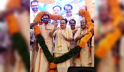BJP national president J P Nadda garlanded by party workers at the extended state executive meeting held at Thiruvananthapuram. Also seen are BJP state president K Surendran, union minister of state for fisheries and veteran BJP leader O Rajagopa.