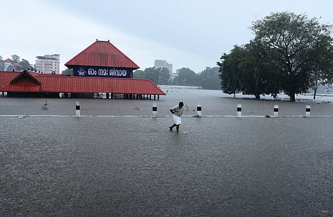 Aluva Mahadeva temple and its premises are submerged in rainwater as water levels at Periyar River rose after dams were opened on Tuesday.