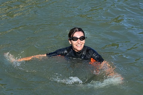 Paris Mayor Anne Hidalgo swims in the Seine river Wednesday, July 17, 2024 in Paris. After months of anticipation, Anne Hidalgo swam in the Seine Rive, fulfilling a promise she made in January nine days before the opening ceremony of the 2024 Olympics.