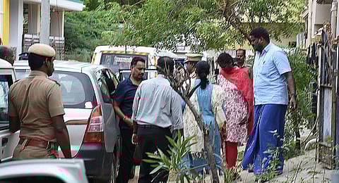 CBCID officials with AIADMK leader and former state minister MR Vijayabaskar in Karur on Tuesday.