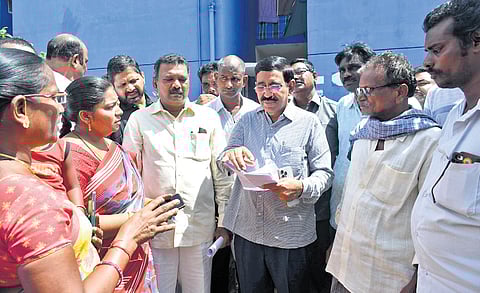 Minister P Narayana inspects tidco houses near Venkatapalem.