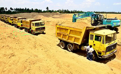 A sand truck is standing in a queue at a sand quarry at the Thenpennai riverbed near Cuddalore