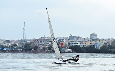 Sailors seen navigating their boats during the YAI 38th Hyderabad Sailing Week on Hussainsagar in Hyderabad on Tuesday