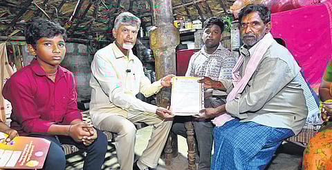 Chief Minister N Chandrababu Naidu handing over pension to the beneficiaries at Penumaka village in Guntur district on Monday