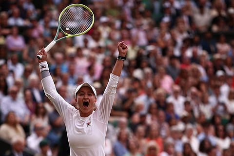 Czech Republic's Barbora Krejcikova celebrates winning against Kazakhstan's Elena Rybakina during their women's singles semi-final tennis match at The All England Lawn Tennis and Croquet Club in Wimbledon on July 11, 2024.