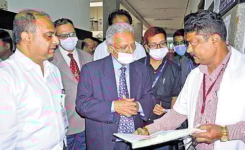 Lokayukta Justice BS Patil inspects facilities and services at Victoria Hospital in Bengaluru on Monday.
