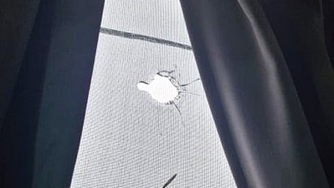 Firing incident in Narsingi, a bullet pierced through the window of an apartment