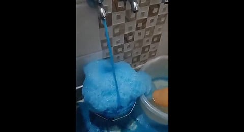 Blue water and foam flow from taps inside Delhi homes