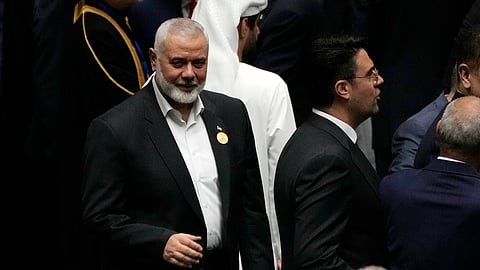 Hamas chief Ismail Haniyeh arrives at the Iranian parliament to attend the swearing-in ceremony of newly-elected President Masoud Pezeshkian, in Tehran, Iran, Tuesday, July 30, 2024.