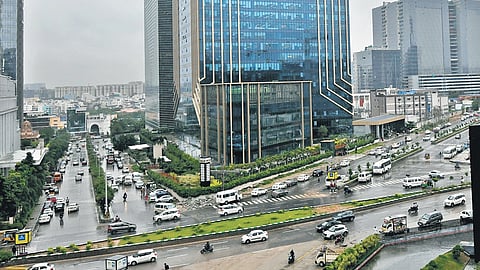 Cars at a road intersection in the IT corridor in Hyderabad.