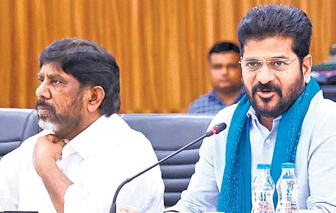 CM Revanth Reddy, along with Deputy CM Mallu Bhatti Vikramarka, at a meeting at Praja Bhavan to discuss crop loan waiver