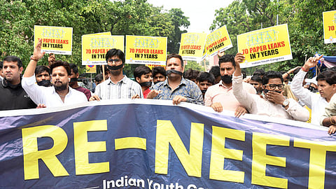Activists stage a protest demanding re-conduct of the NEET exam, in New Delhi on Monday, July 22, 2024.