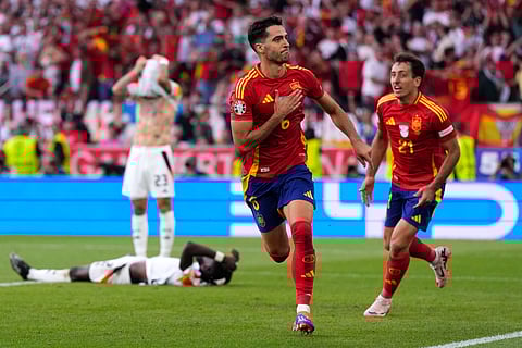 Spain's Mikel Merino celebrates after scoring the second goal.