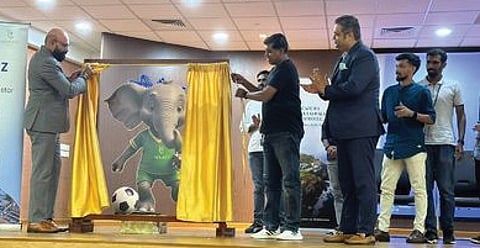 Former international footballer Vinu Jose (right) unveils the mascot, ‘Raju’, of Raviz Prathidhwani Sevens Football Tournament at Technopark in Thiruvananthapuram