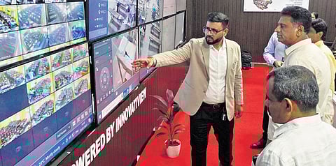 Higher Education Minister MC Sudhakar inspects the webcasting system adopted by KEA to ensure transparency in exams.