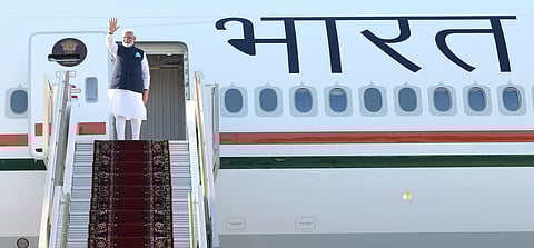 Prime Minister Narendra Modi greets as he departs for Austria after a 2-day visit to Russia, in Moscow Tuesday, July 9, 2024.