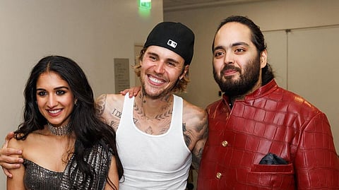 Singer Justin Bieber poses for a photo with Anant Ambani and his fiancé Radhika Merchant