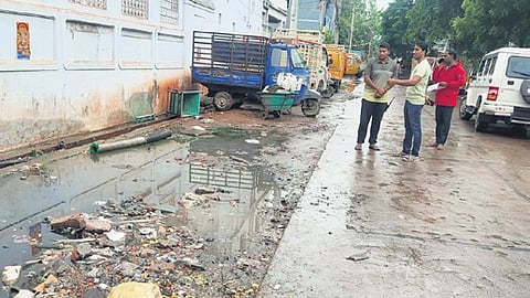 Waste and rainwater accumulation.