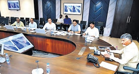 Chief Minister Nara Chandrababu Naidu holds a review meeting with officials of the Excise and Mines and Geology departments on Wednesday I Express