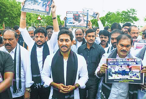YSRC president YS Jagan Mohan Reddy leads a protest rally of party MLAs and MLCs to the State Assembly on Monday.