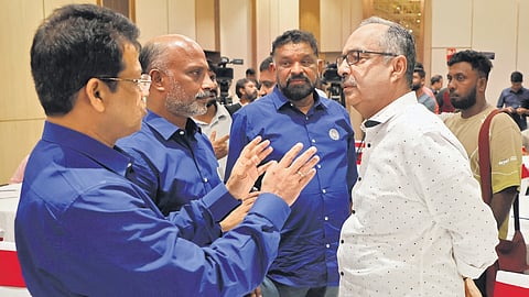 Kerala Cricket Association president Jayesh George, secretary Vinod S Kumar and governing council chairman Nazir Machan interacting with Jose Pattara, one of the bidders who won a franchise for the upcoming T20 Kerala Cricket League