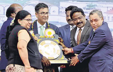 Members of the Bar associations presenting a memento to DY Chandrachud during the 20th anniversary of setting up of Madurai Bench of Madras HC