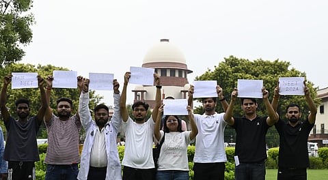 Students at Supreme Court during the hearing of alleged NEET paper leak case in New Delhi on Thursday.