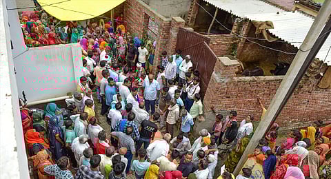 Relatives mourn at the residence of three family members who died in the recent stampede at the 'satsang' of Baba Narayan Hari alias Saakar Vishwa Hari Bhole Baba in Hathras