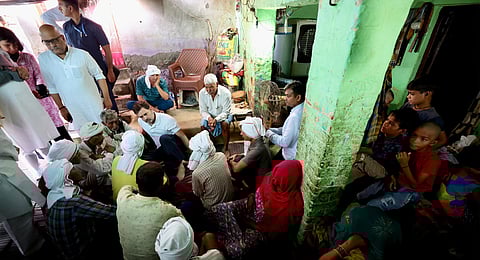 Congress leader Rahul Gandhi meets families of the victims of Hathras stampede incident, in Pilkhana village of Aligarh, Friday, July 5, 2024.