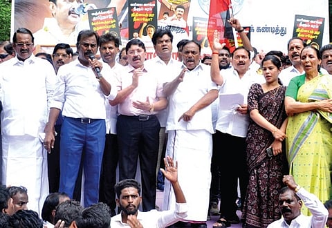 DMK cadre protest at the collectorate in Chennai on Saturday