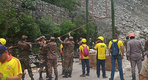 Army officials and SDRF team carry out rescue operations in Sonprayag, Uttarakhand on Sunday.