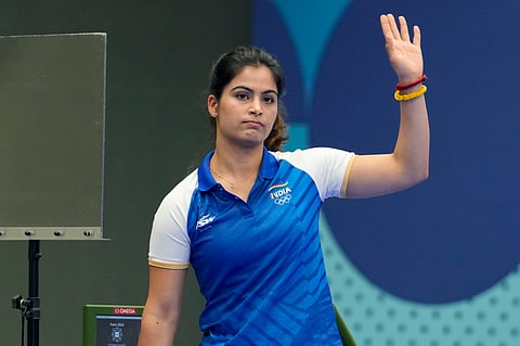 India's Manu Bhaker reacts after getting eliminated from the 25m pistol women's final at the 2024 Summer Olympics (Photo | AP)