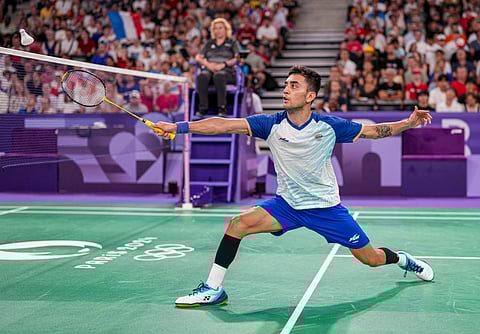 India's Lakshya Sen returns to compatriot HS Prannoy during the men's singles Round of 16 badminton match at the 2024 Summer Olympics