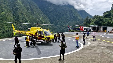 Helicopter being used to rescue stranded people following cloud-burst and heavy rains, at Bhimbali area, in Rudraprayag.