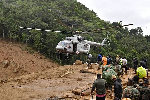 A chopper joins search and rescue operations following landslides in Mundakai, Chooralmala area, Wayanad district, Kerala.