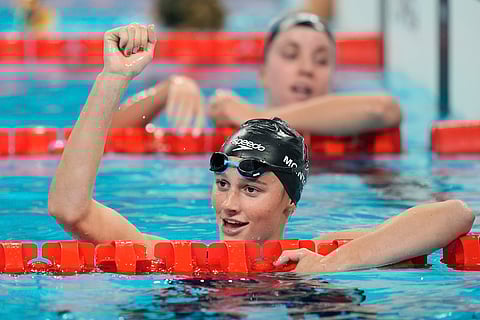 Summer McIntosh, of Canada, celebrates winning the the women's 200-meter butterfly final at the 2024 Summer Olympics in Nanterre, France, Thursday, Aug. 1, 2024.