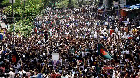 People participate in a rally against Prime Minister Sheikh Hasina and her government demanding justice for the victims killed in the recent countrywide deadly clashes, in Dhaka.