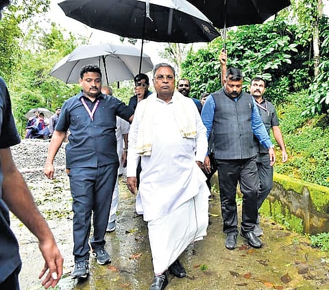 Chief Minister Siddaramaiah inspects a flood-affected region in Kodagu district on Friday